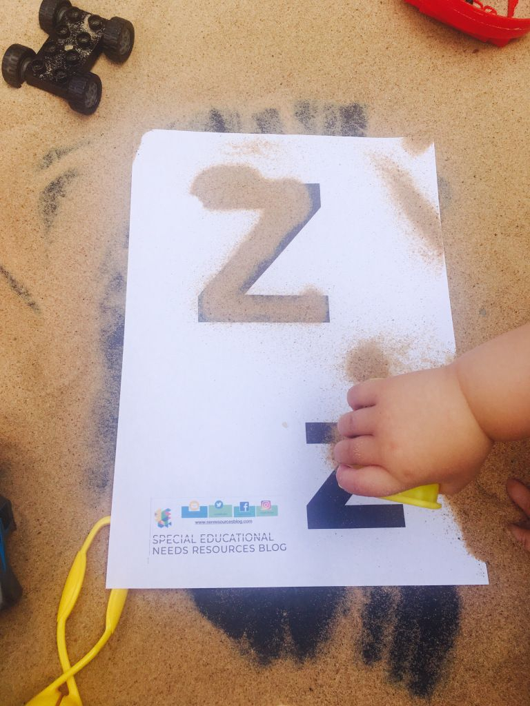 Practising Forming The Letters Of The Alphabet In The Sand throughout Tracing Letters In Sand