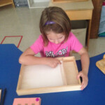 Tracing The Sandpaper Letter And Drawing It In Sand Tray regarding Sand Tracing Letters